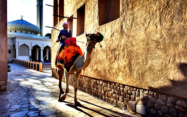 Emirati Sheikh Riding Camel in Old Dubai