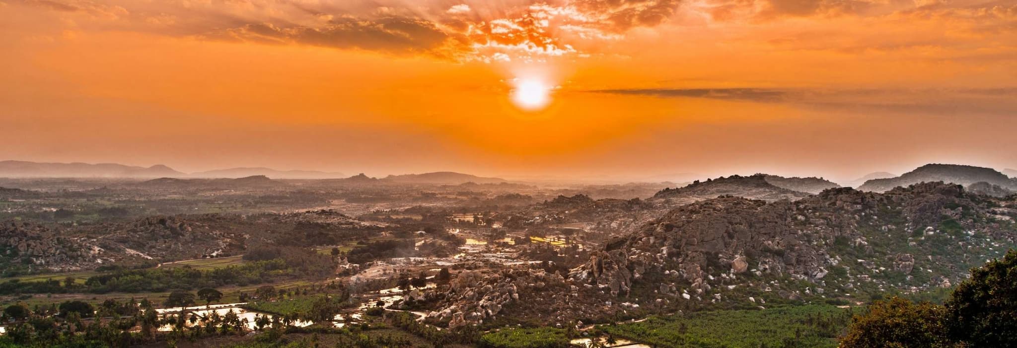 Sunset view over the gigantic boulders atop Anjanadri hill