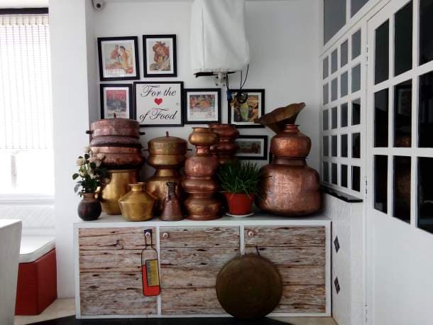 Display of copper vessels, Rendezvous Cafe Restaurant