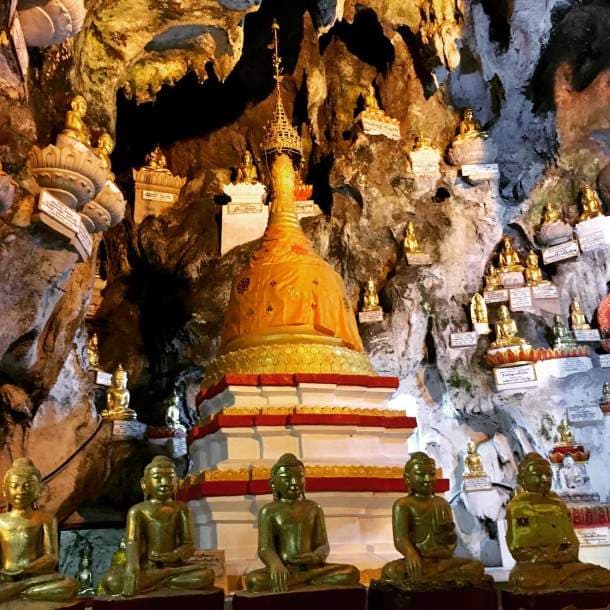 Pagoda and Buddha statues inside the Pindaya Caves