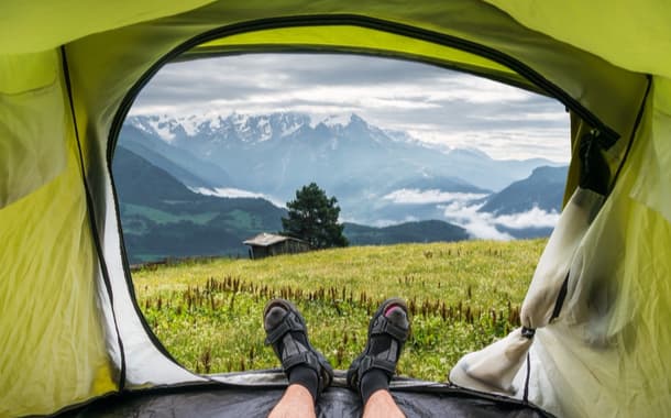 View from inside a tent on the old shack and mountains in Georgia